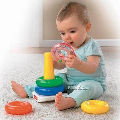 Tháp gồm 5 vòng tròn màu sắc giống các viên kẹo với các kích thước từ to tới nhỏ. Tháp gồm 5 vòng tròn màu sắc giống các viên kẹo với các kích thước từ to tới nhỏ.