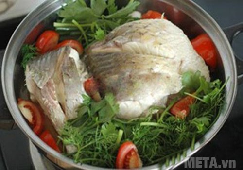 Cho cá lên trên xả và gừng Cho cá lên trên xả và gừng